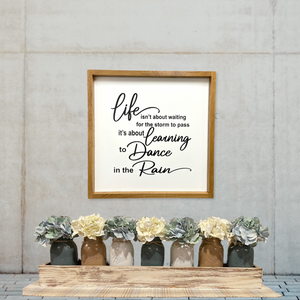 Sign framed Life isn’t about waiting for the Storm to pass Oak frame 19.5”x19.5” - Wooden Hearts Inc