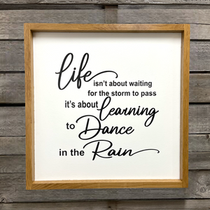 Sign framed Life isn’t about waiting for the Storm to pass Oak frame 19.5”x19.5” - Wooden Hearts Inc